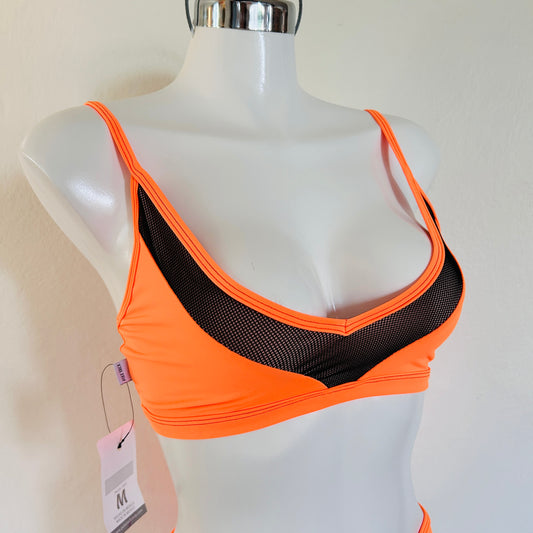 Top modelo Aura naranja neón